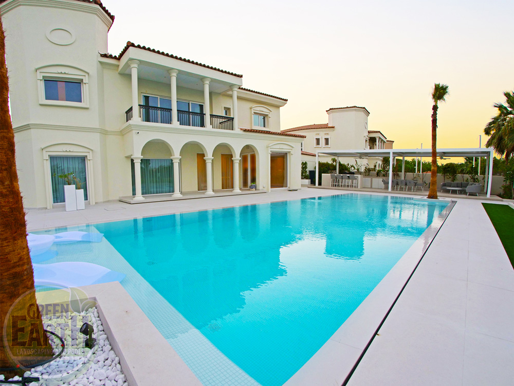 Completed Green Community villa landscape with swimming pool, pergola, and planting